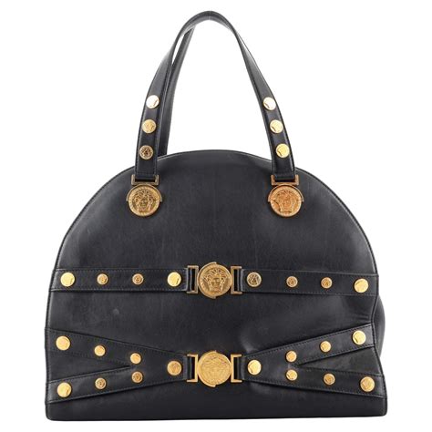 versace tribute clutches bags|versace handbags with big zipper.